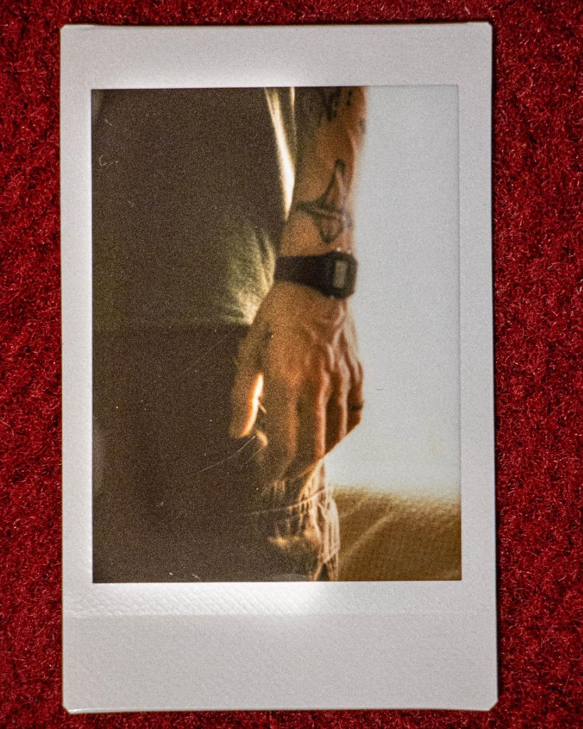 Polaroid of Pedro Flynn's hand and watch