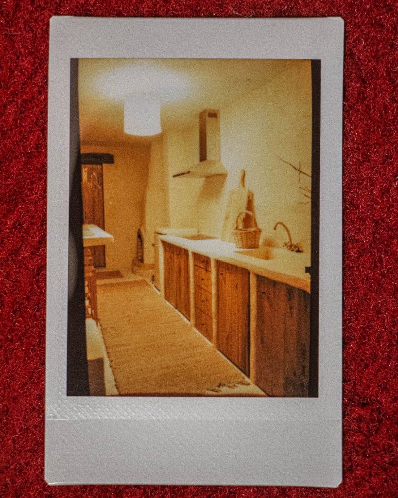 Polaroid of a rustic kitchen interior
